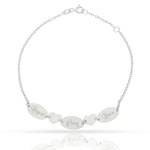 PULSERA ORO BLANCO 18KL CHAPAS + CORAZONES